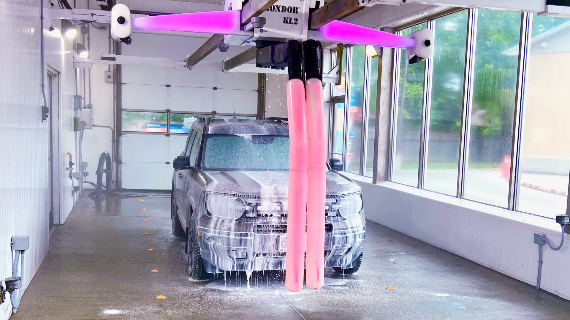 Presoak cycle in touchless carwash at Miami Car Wash London Ontario